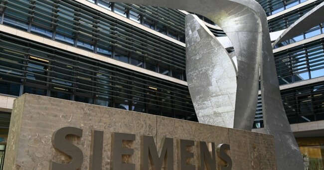 Siemens ups outlook after tripling profit in Q2