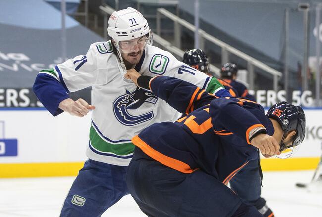 Canucks' Zack MacEwen suspended game for kneeing