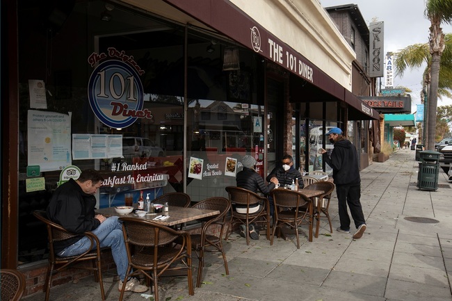 US stocks end at records as weak jobs data boost stimulus hopes