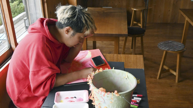FEATURE: Japan Alps lodge owner turns to artists to protect environment