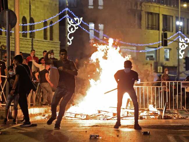 Dramatic footage of killings and mob violence as Israeli-Palestinian hostility erupts in Jerusalem and the West Bank
