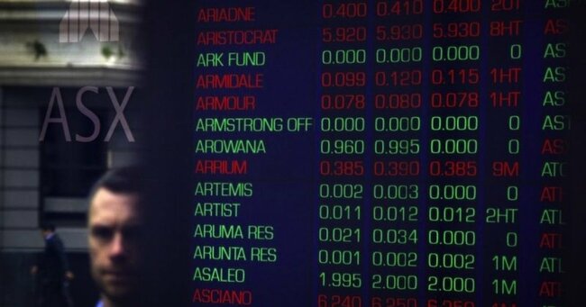 Asian shares jump on hopes for low rates, oil up on cyber attack