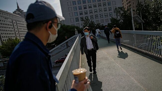 The Latest: Joint venture aims to make 1B doses for Chinese