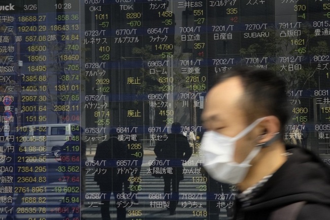 Tokyo shares open lower after Wall Street fall