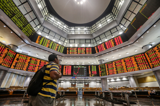 Bursa Malaysia remains lower at mid-morning