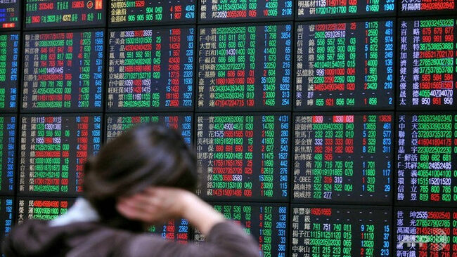 Taiwan stocks plummet on virus restrictions and tech selloff