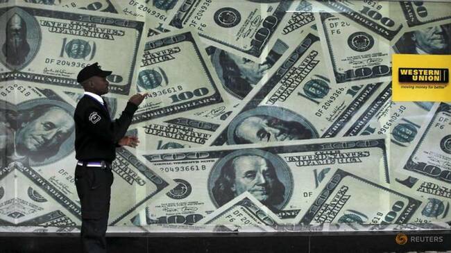 Dollar rises moderately on jump in US inflation