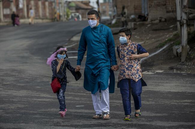The Latest: Sri Lanka banned travel throughout country