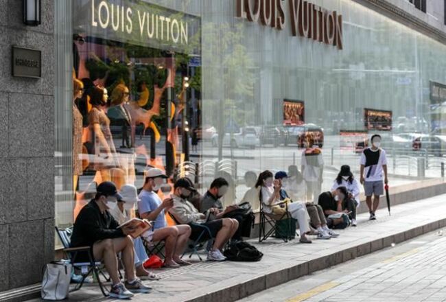 Young Koreans flock to luxury goods as society tells them looks means everything