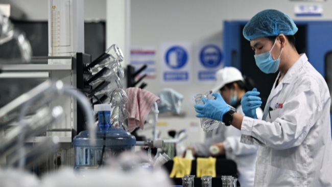 China improves, upgrades industrial structure over 5 years