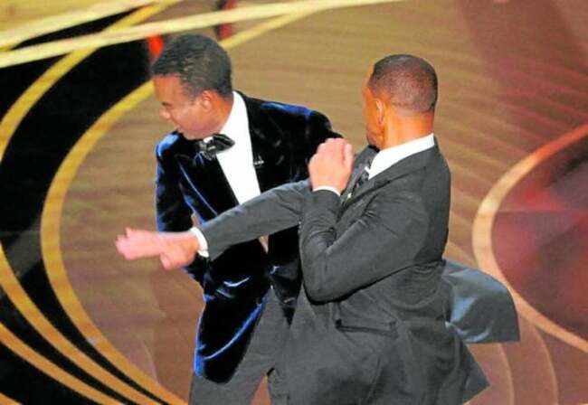 Chris Rock unleashes on Will Smith and wife Jada a year after Oscars slap
