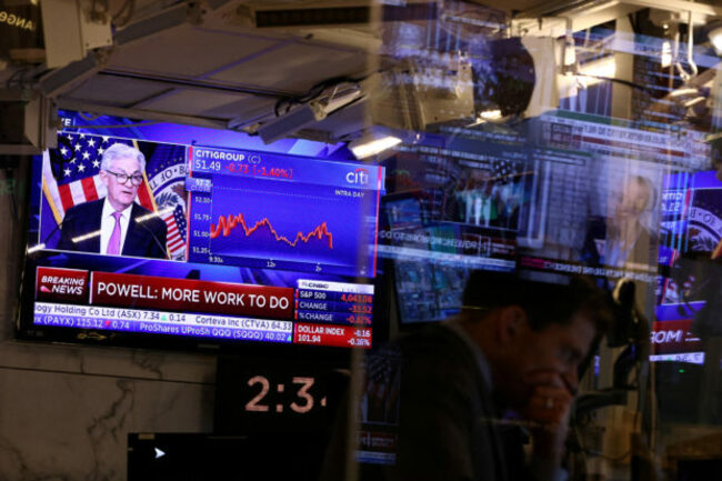 Wall St ends sharply lower, Treasury yield inversion widens after Powell remarks
