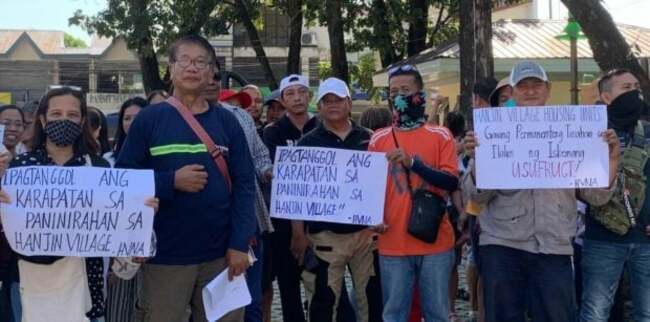 Displaced Hanjin workers fight eviction from housing village in Zambales town