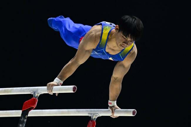 Carlos Yulo claims parallel bars gold in Baku World Cup