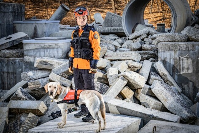 Rescue dog Tobaek returns from Turkey a national hero