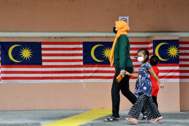 Let foreign-born kids of Malaysian mums into schools pending citizenship reforms, Putrajaya told