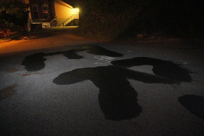 Additional graffiti appears around campus