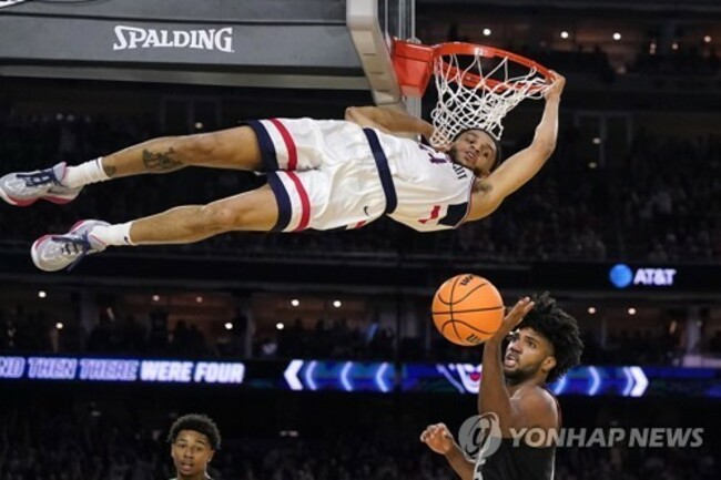 APTOPIX NCAA Miami UConn Basketball