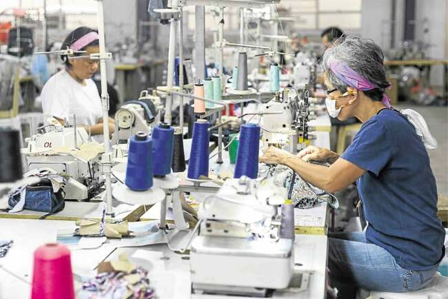 Factory growth slid to 7-mo low in March