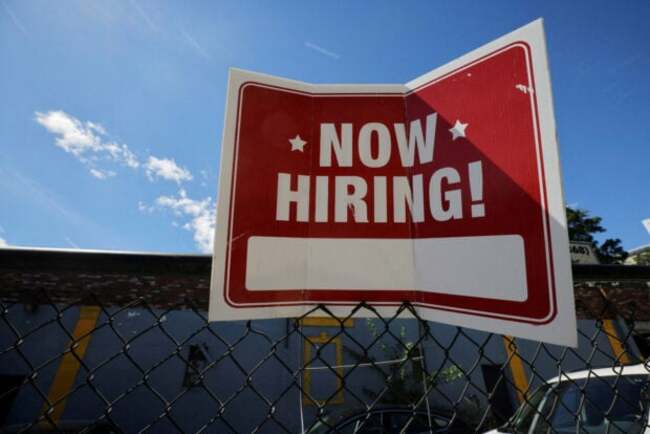 US economy still churning out jobs at brisk clip; wage pressures subsiding