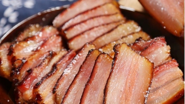 Alluring aroma of cured meat wafts out from Chongqing to world