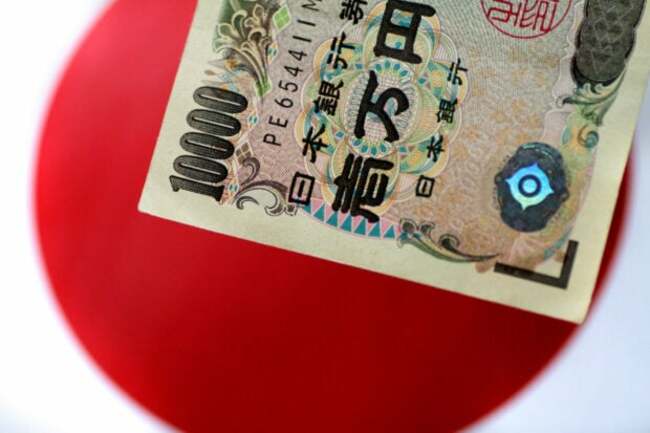 Japan's current account swings back to black on overseas investment