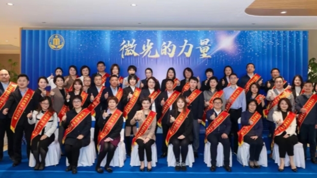 Shanghai has more community workers, and they make it their career