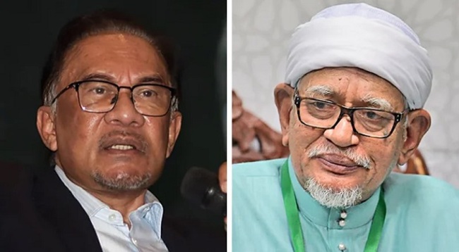 PAS MB SHOWS HE'S MORE SAVVY THAN ‘MAD DOG' BOSS HADI – ROLLS OUT RED CARPET FOR ANWAR'S RAYA OPEN HOUSE IN T'GANU – WHILE HADI ONLY KNOWS HOW TO BARK WILDLY & STUPIDLY AT ‘COMMUNIST' KIT SIANG – EVEN THOUGH HE HAD PRAISED CHINA-BROKERED PEACE DEAL BETWEEN SAUDI ARABIA & IRAN TO THE SKIES – IS HADI SO IGNORANT HE DIDN'T REALISE CHINA IS RULED BY A COMMUNIST PARTY?