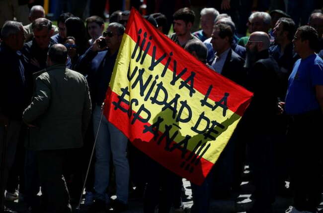 Three arrested as Spain exhumes fascist movement's founder