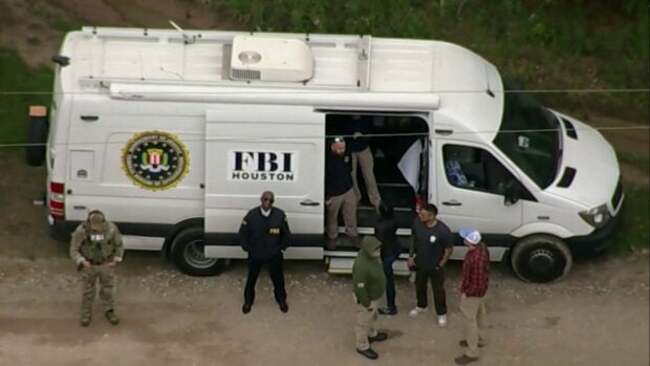 Police still searching for Texas man accused of killing five neighbors