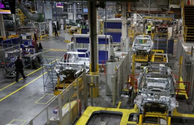 UK factory activity shrinks in April but cost pressures ease -PMI