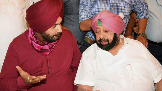 Photos: Flanked by Captain, Sidhu takes charge of Punjab Congress