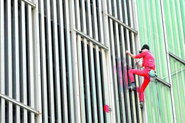 ‘French Spiderman' takes climate campaign to new heights