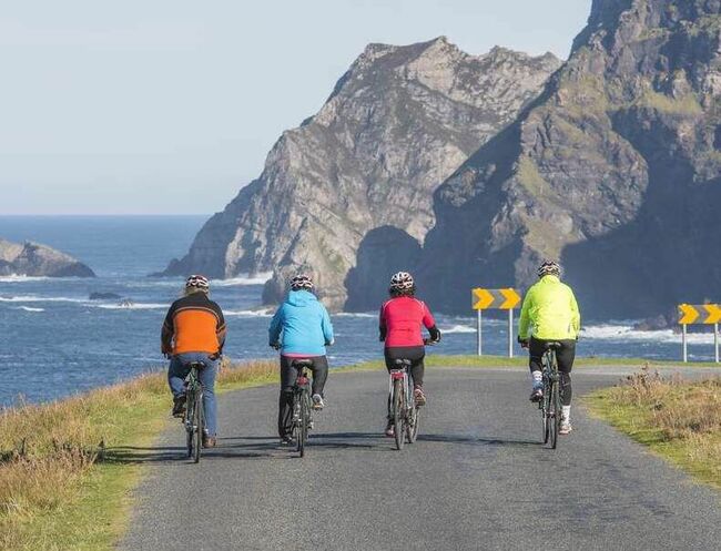 Exploring Atlantic Ocean's coast at Glencolmcille, Donegal