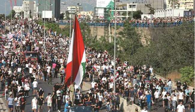 Tears and anger as crowds mark Beirut monster blast