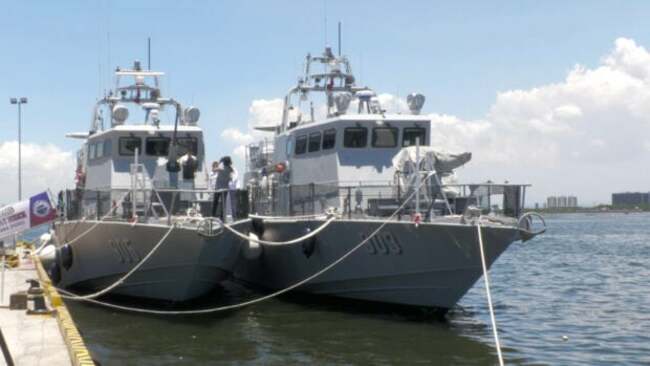 Marcos witnesses commissioning of two new PH Navy gunboats