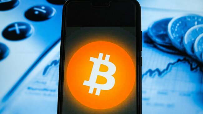 Bitcoin jumps above $50,000 for first time since May