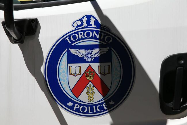 Toronto police officer criminally charged with breach of trust, suspended with pay