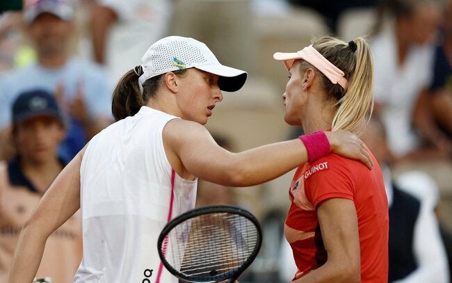 French Open: Iga Swiatek through to last eight as Ukrainian Tsurenko retires unwell