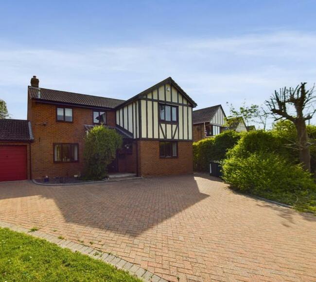 Enjoy a slice of the quiet life at this spacious detached four-bed