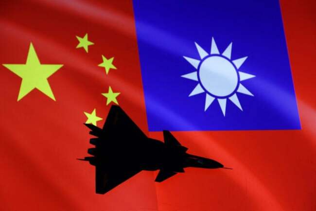 Taiwan activates air defense as China aircraft enter zone