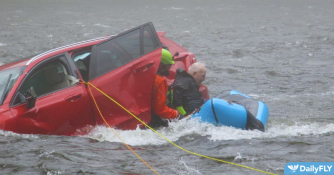 USFS Firefighter and community members assists with vehicle in the Lochsa river accident