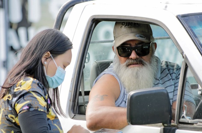 Neighbourhood vax boosting uptake