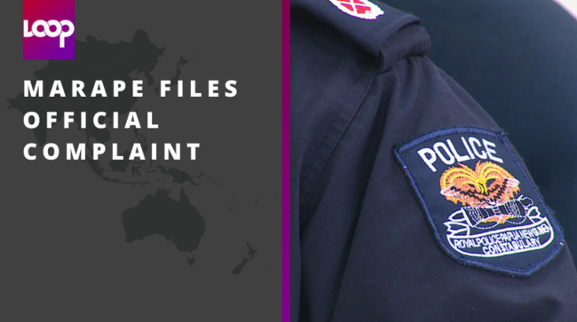 Marape files official complaint