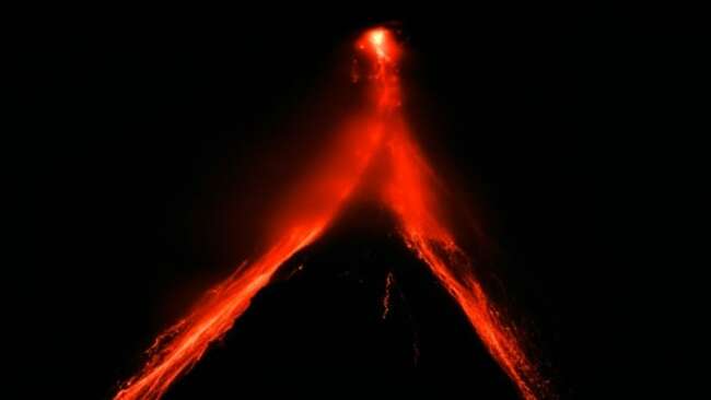 Mayon volcano lava flows in Philippines, thousands decamp to evacuation centres