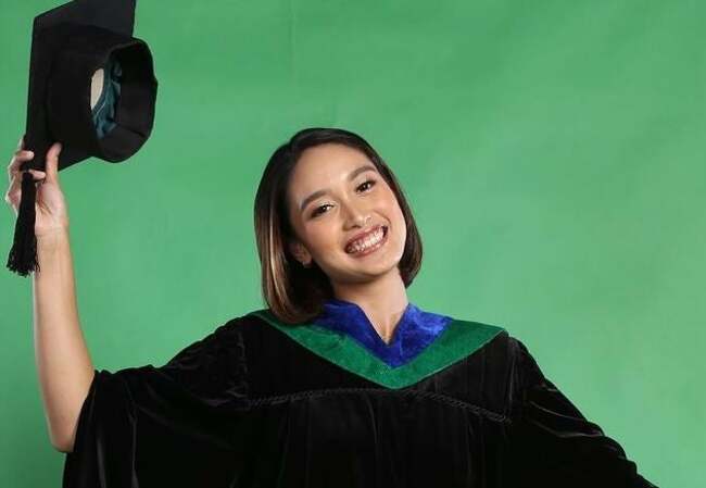 PVL-bound Imee Hernandez graduates cum laude from UST