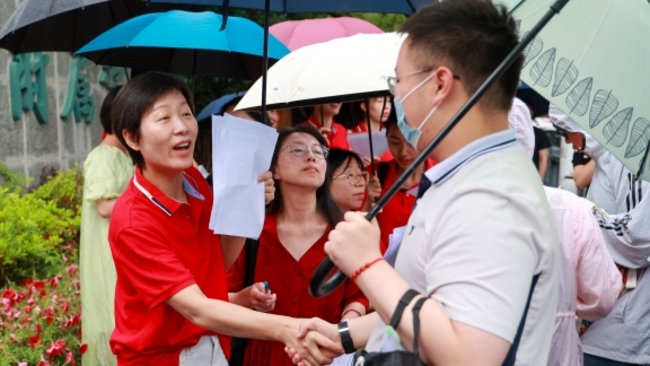 Students taking high school entrance exams keep their cool