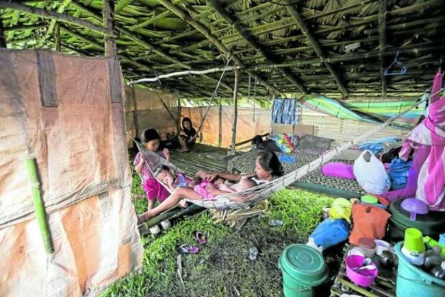 Albay evacuees outside of Mayon's danger zone refuse to leave shelters