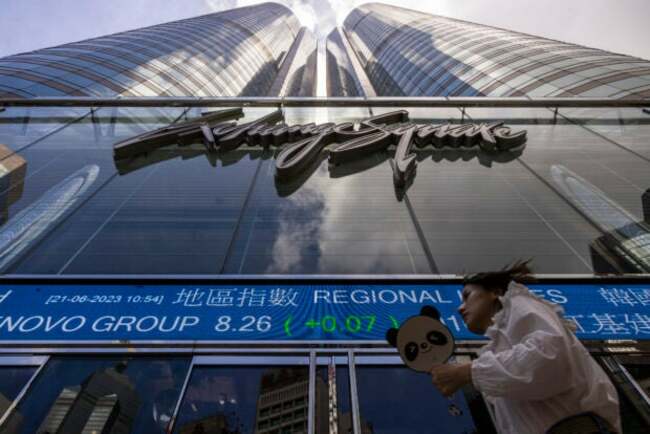 Asian shares mostly lower, tracking Wall Street retreat