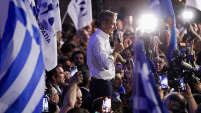 Greece's conservatives win election, pledge more reforms